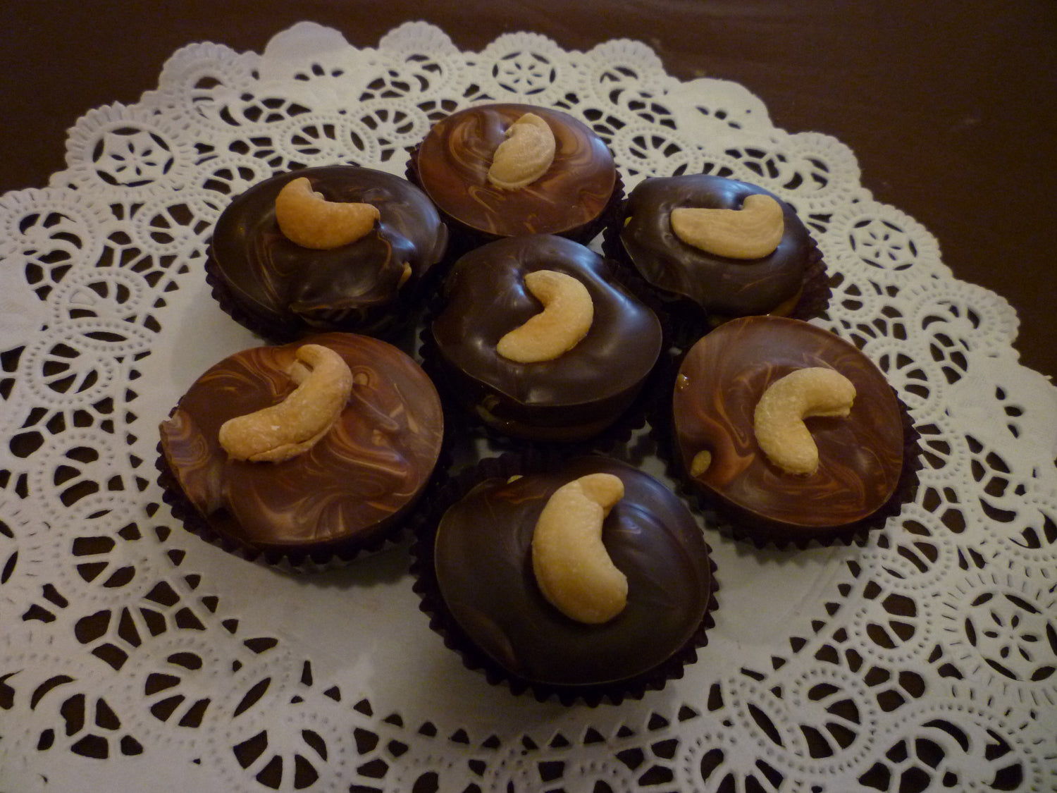 Several of our Cashew Turtles in Milk and Dark Chocolate