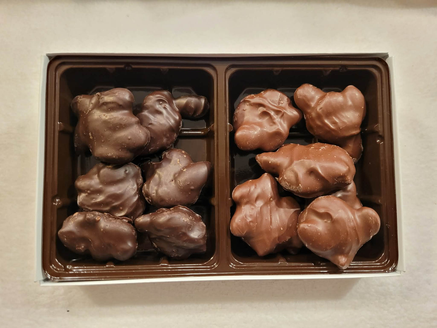 Box of chocolate candies on a light background