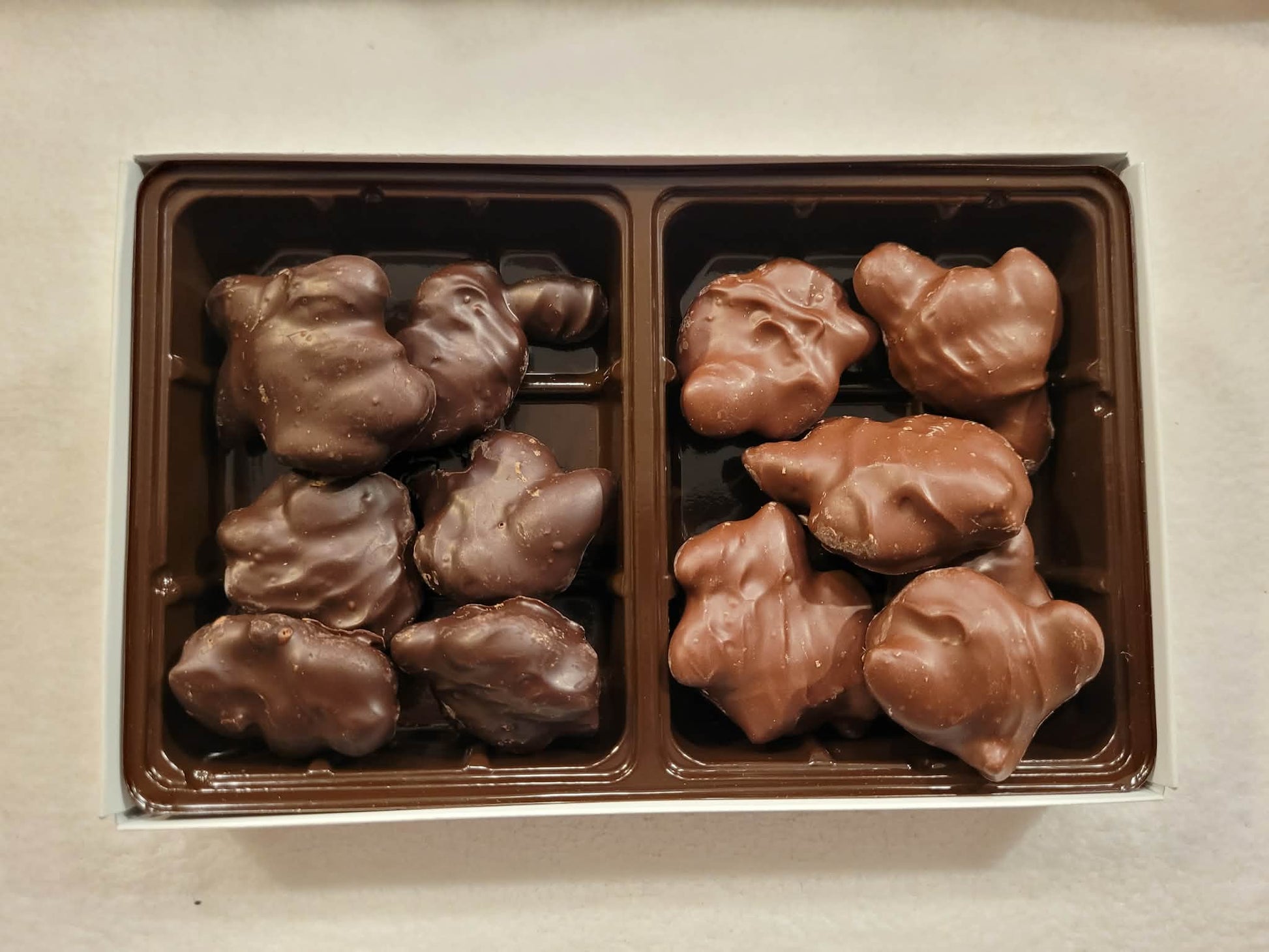 Box of chocolate candies on a light background