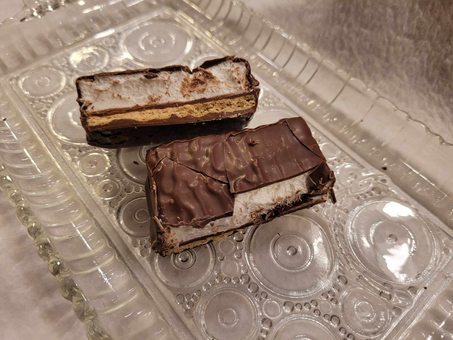 Smore's Sandwiches - Graham Cracker topped with Marshmallow, all surrounded by rich Milk Chocolate